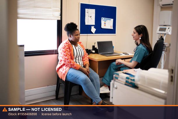 Michigan physician consulting with a patient, supported by Medical Management Systems billing and credentialing services