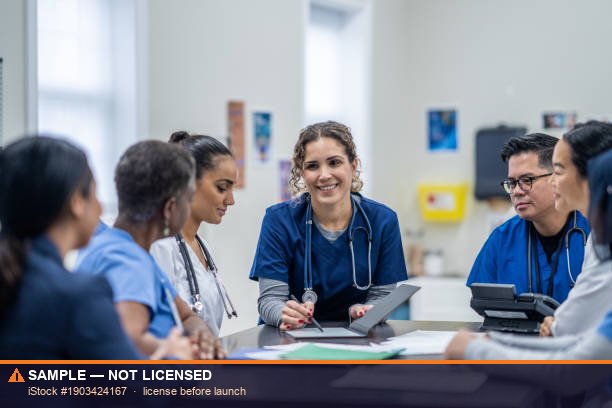 A Michigan medical team meeting to plan a practice's billing and credentialing — the kind of local, personal support MMSM brings